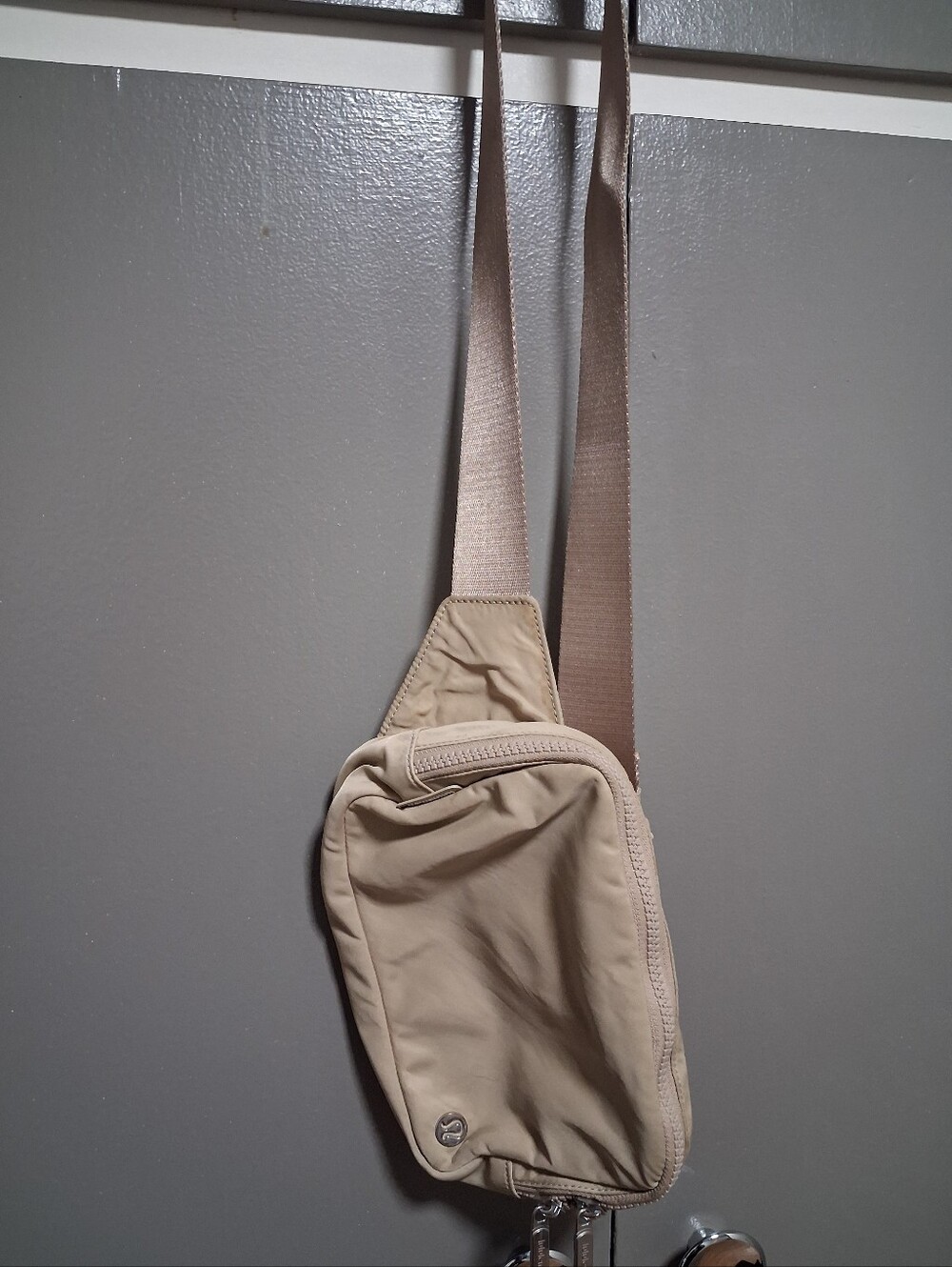 Luluemon Cream Sling Belt Bag with Adjustable Strap